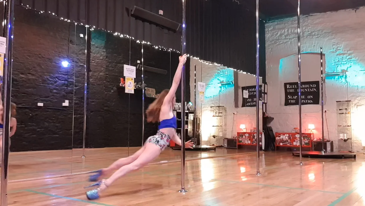 learn pole dance spins online flying squirrel tutorial
