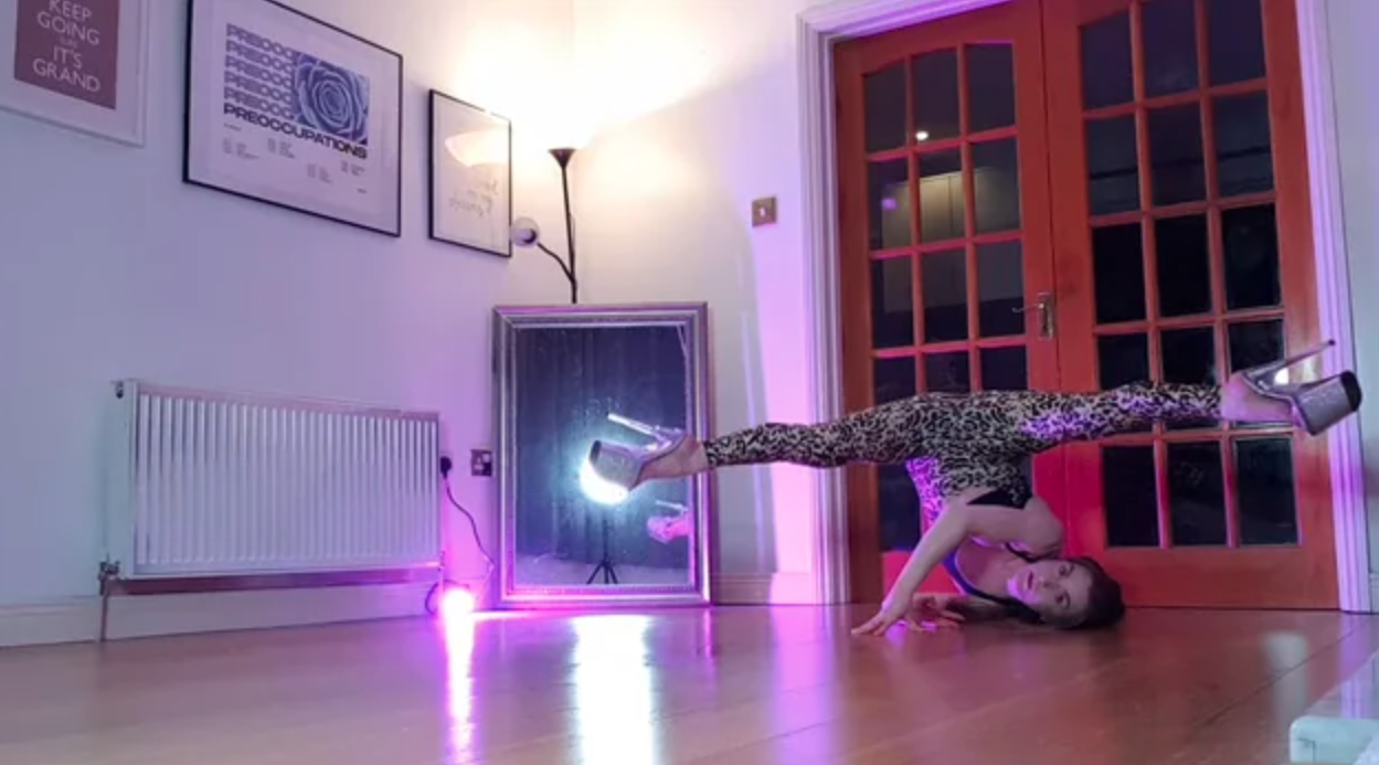 arlene demonstrating advanced floorwork choreography